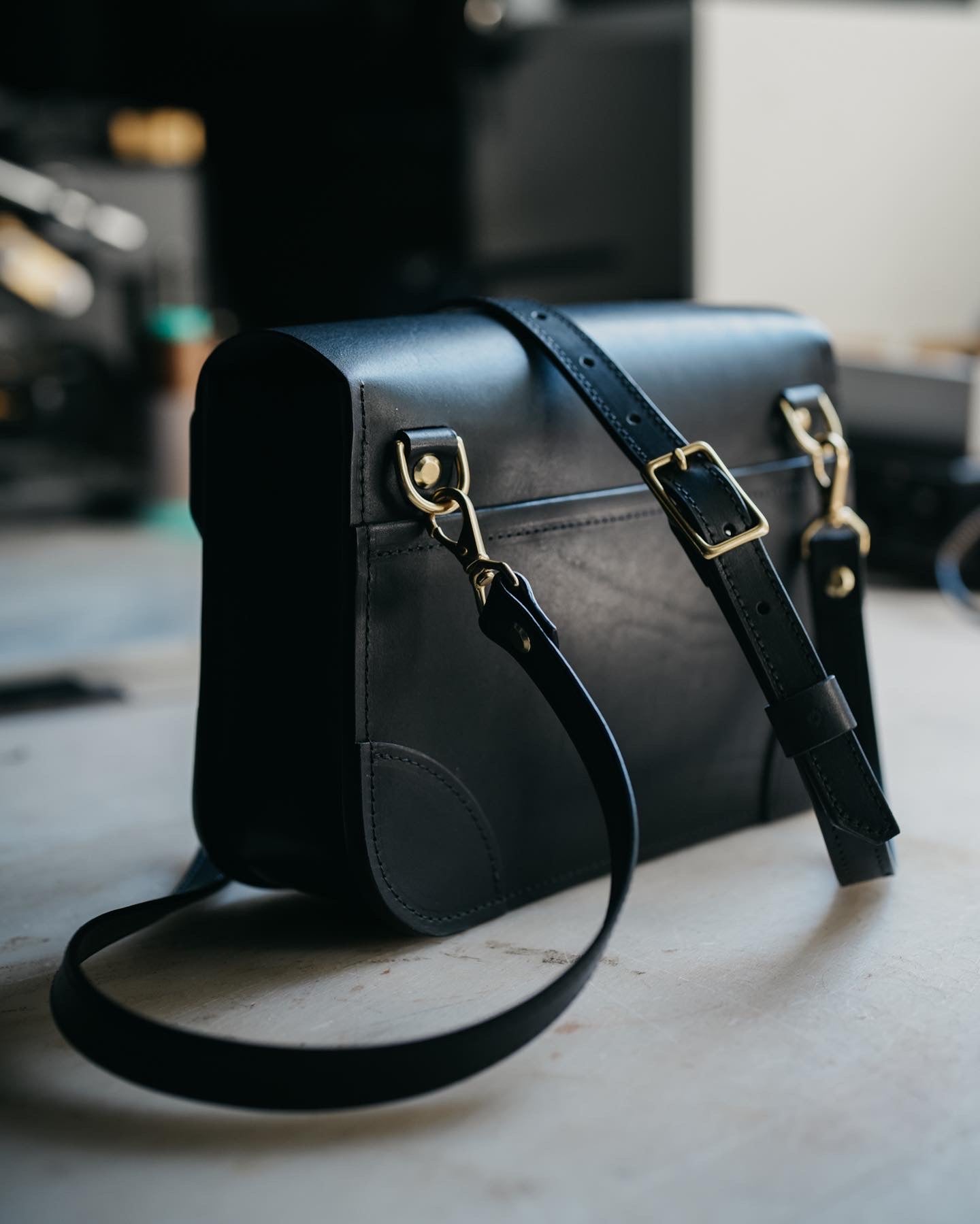 The Traveler Crossbody Bag - Black & Gold